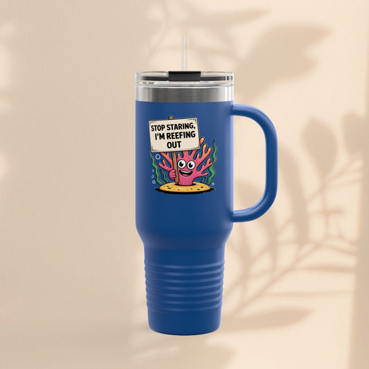Insulated travel mug in royal blue with coral reef cartoon graphic and straw lid
