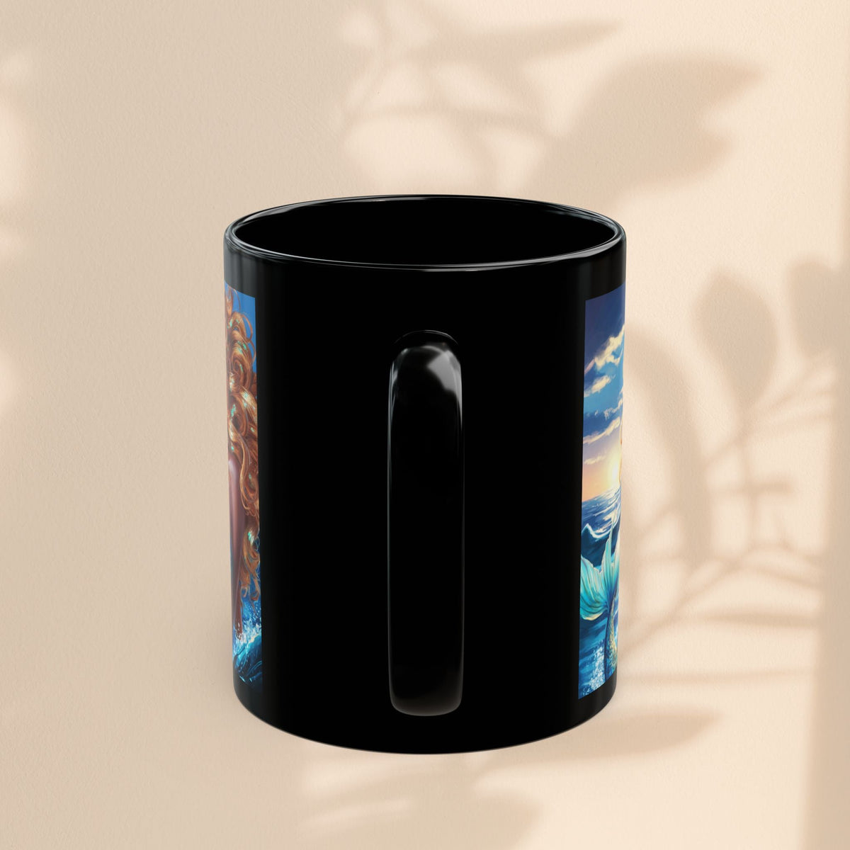 Black ceramic mug with partial mermaid artwork on side