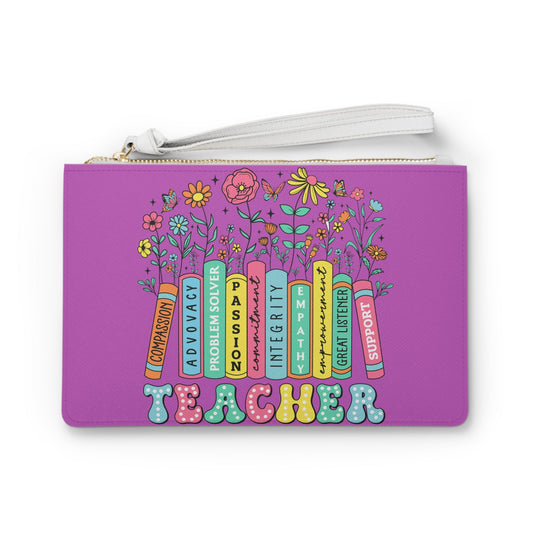 Purple rectangular clutch with floral words print, gold zipper, and white wrist strap.