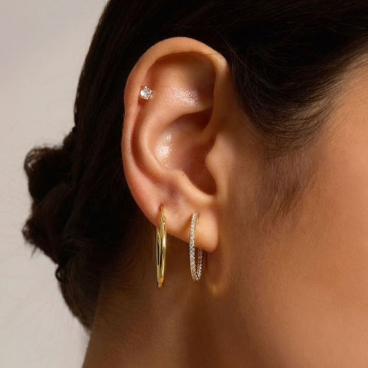 Medium hoop set with two small hoop earrings, one gold and one pavé