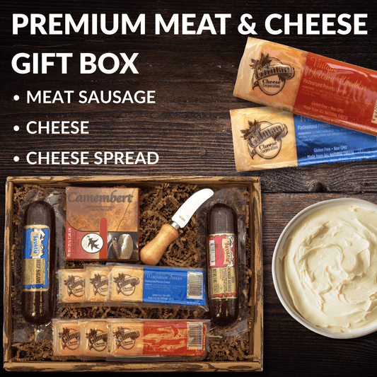 Deluxe meat and cheese gift box arranged with sausage, cheese bars, and cheese spread