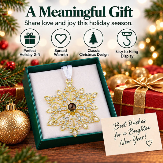 Crystal snowflake ornament in gift box with hanging ribbon and dark center jewel