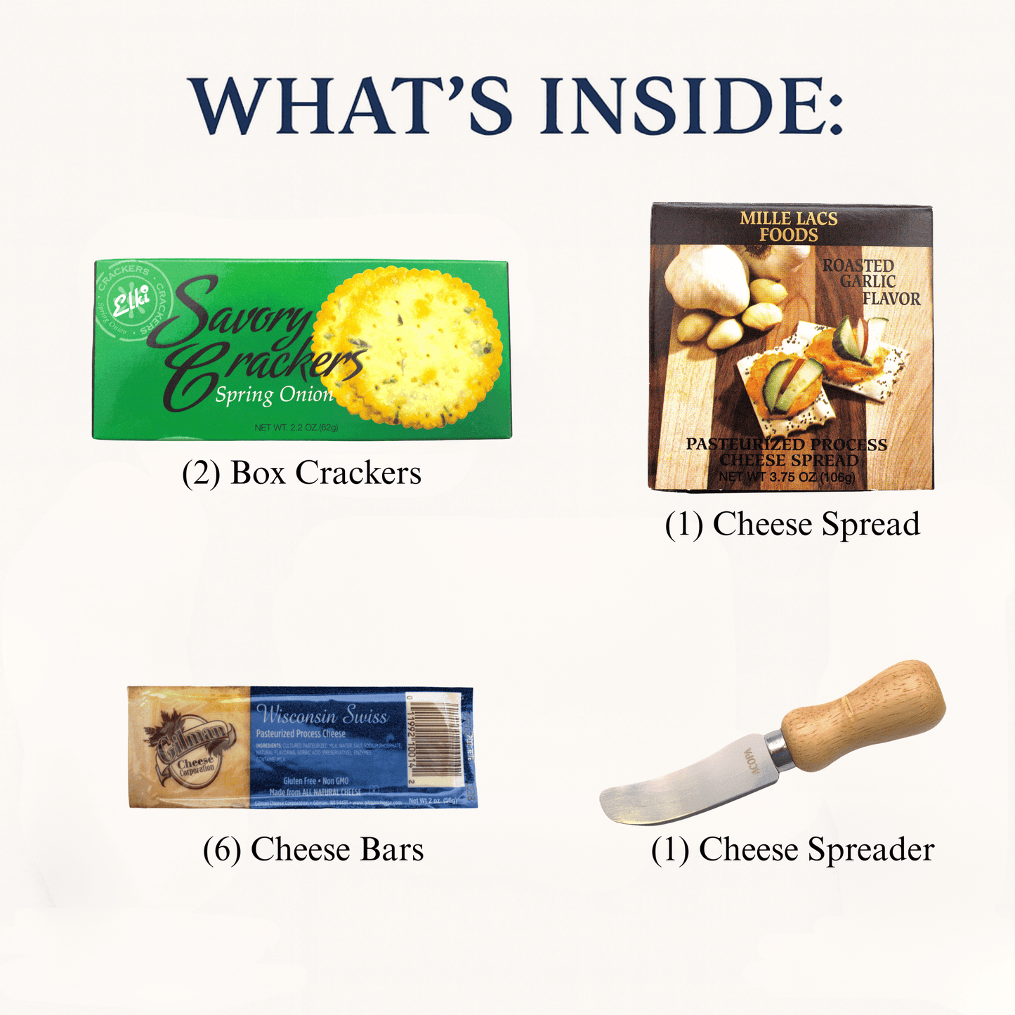 Assorted cheese gift contents with cracker and cheese packages and a wooden cheese spreader