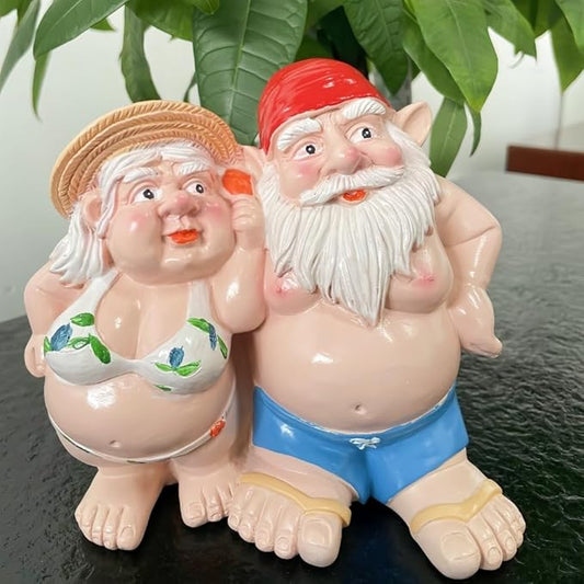 Resin double gnome statue of woman and man gnomes, red and straw hats, blue shorts