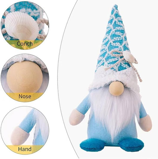 Plush beach gnome detail: shell, round nose, and hands on the knit cone hat