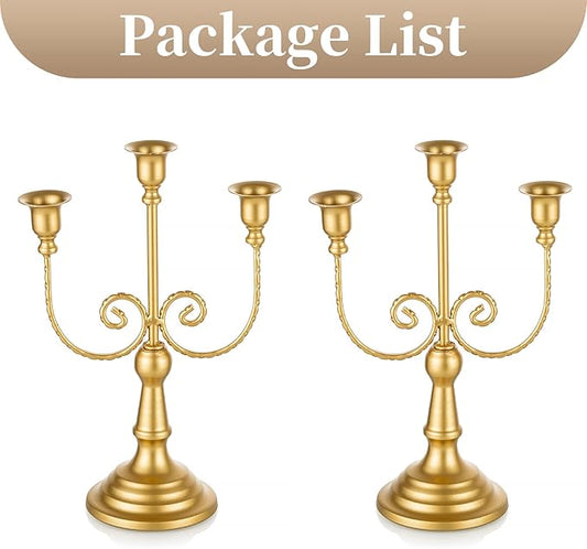 Gold three-stem taper candle holder pair with curled scroll arms and pedestal bases