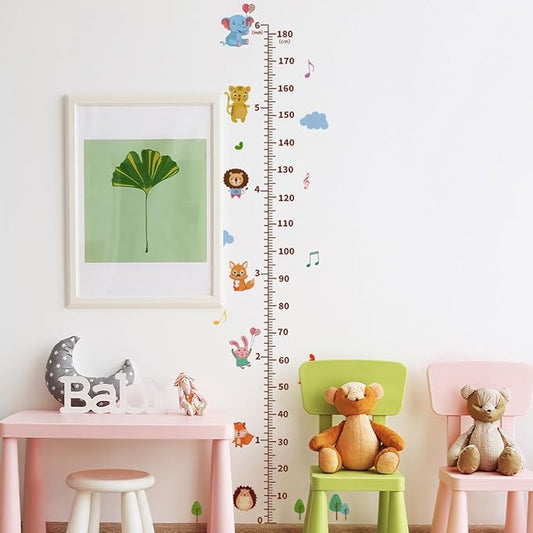 Nursery wall growth chart sticker with cartoon animals, clouds, and musical notes