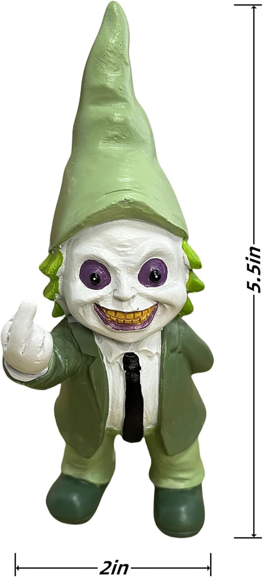 Green gnome statue with white skull face, purple eyes, black tie, side view
