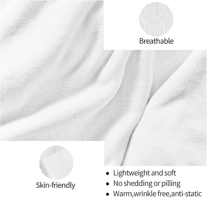 White fleece throw blanket fabric closeup with soft, breathable texture