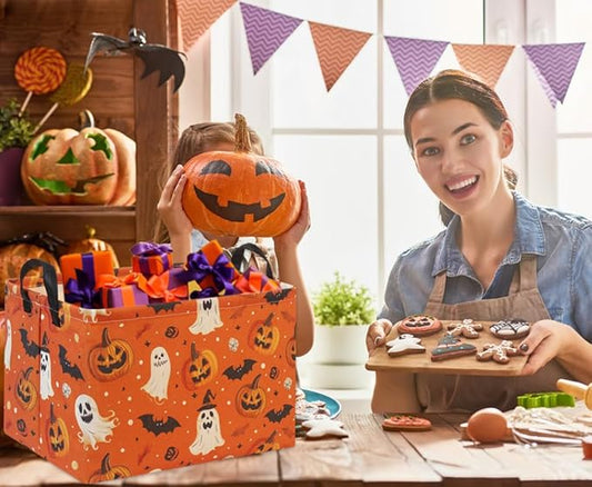 Orange Halloween pumpkin trick-or-treat basket with cute ghost, bat, and jack-o-lantern patterns