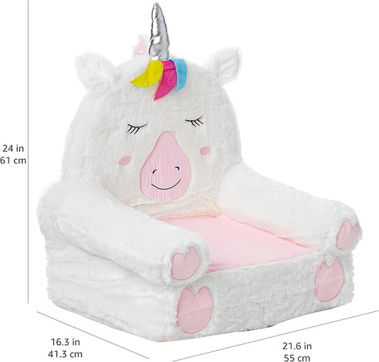 White unicorn plush toddler chair, pink inner cushion and heart-shaped side pads, rainbow mane