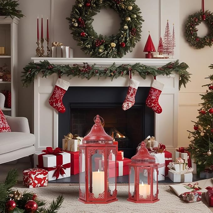 Red decorative lantern set with glass panels and lit candle flames