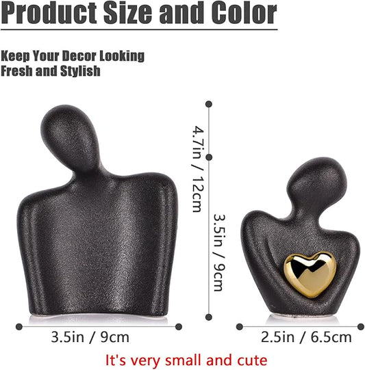 Mini couple statue decor set: small matte black figures with gold heart emblem