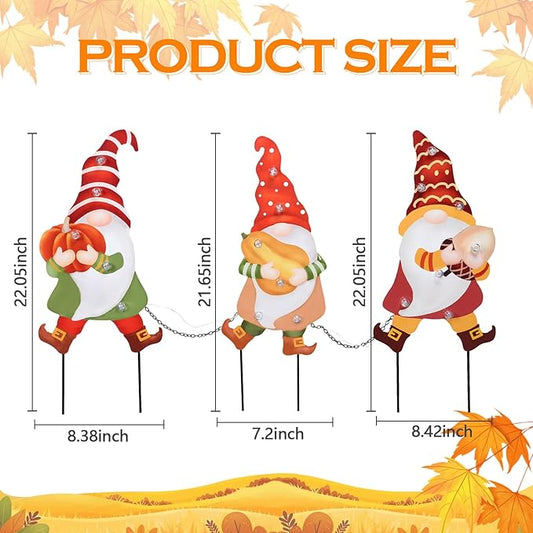 Three LED gnome yard stakes with red-striped hats and chains, outdoor fall decorations