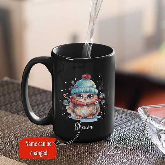Black ceramic coffee mug with winter owl graphic and 'Shawn' name, left handle