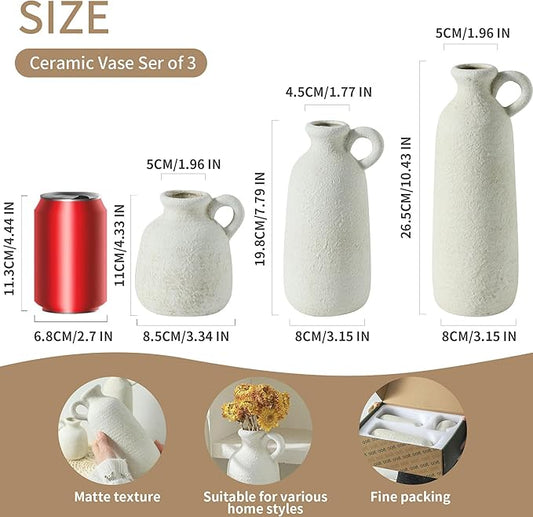 Set of 3 white ceramic vases, three sizes shown with loop handles and textured finish