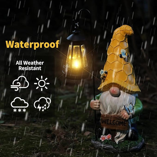 Outdoor gnome solar statue with glowing lantern under rain, yellow robe and welcome sign