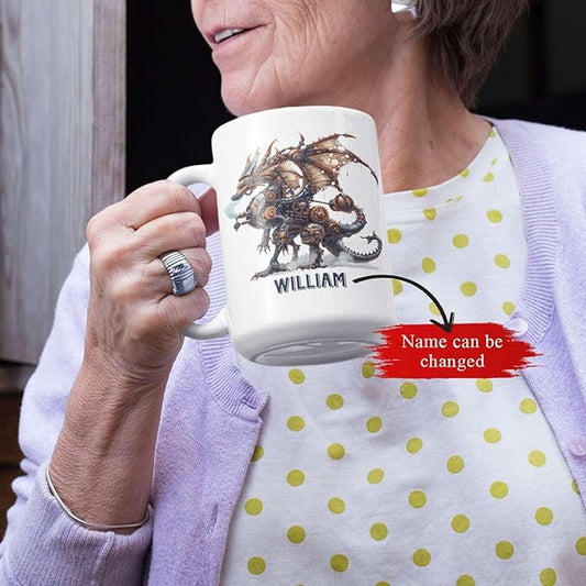 White ceramic mug held in hand, featuring a mechanical dragon graphic and name