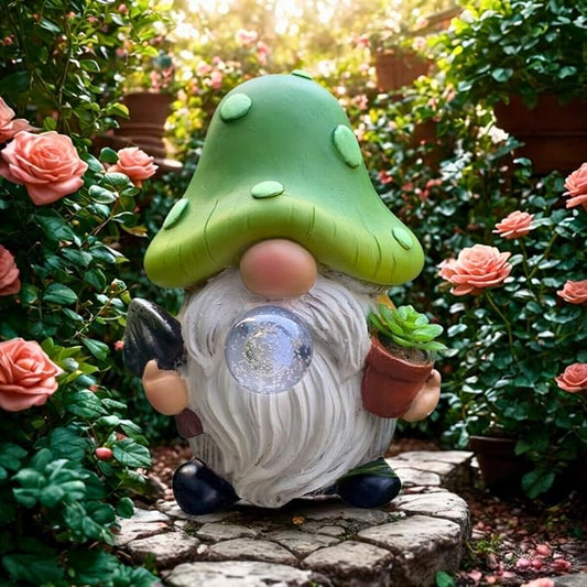 Solar garden gnome statue outdoors, green mushroom head with glowing orb and white beard, seated