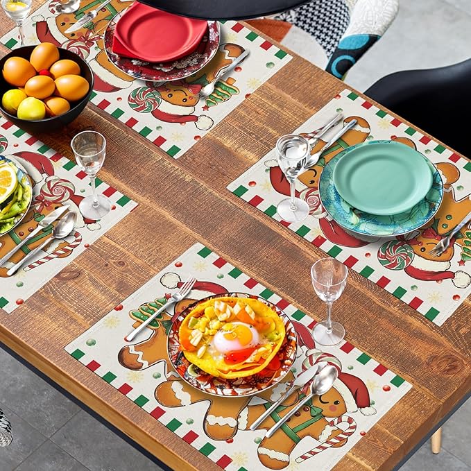 Gingerbread-themed Christmas placemats on dining table with red-green plaid border runners