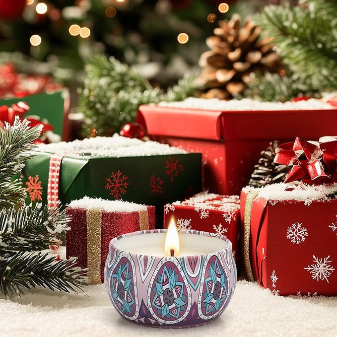 Patterned ceramic jar candle with a lit wick on a holiday table setting