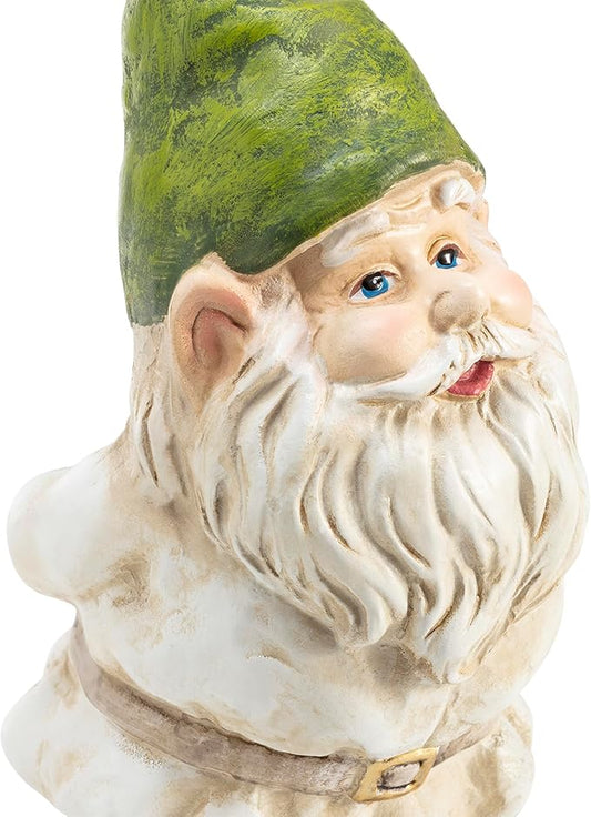 Close-up of green hat and long white beard garden gnome yard statue with blue eyes