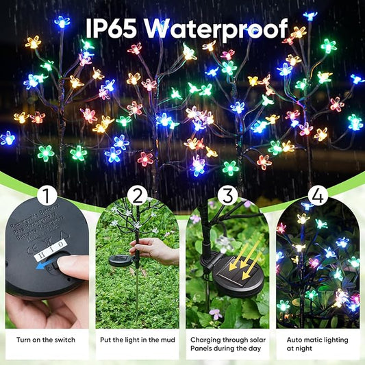 Solar garden light set with glowing butterfly flowers and ground stakes