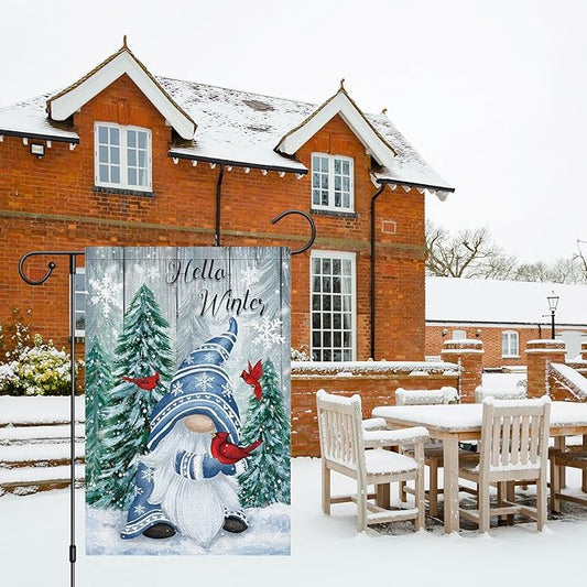 Double-sided winter yard flag showing snowman in blue hat, red cardinals, and pine trees