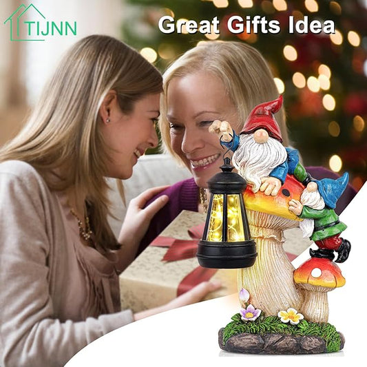 Solar gnome statue on mushroom holding a lit lantern with colorful boots and flowers