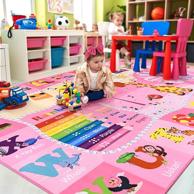 Pink kids ABC rug with animal pictures and colorful rainbow-style number bands.