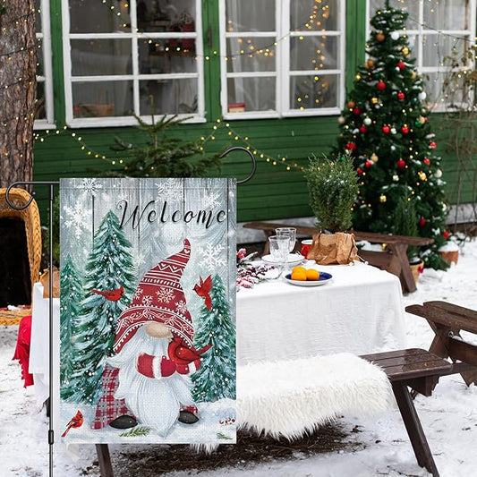 Outdoor winter Welcome garden flag with gnome, red cardinal, green trees, and snowflakes