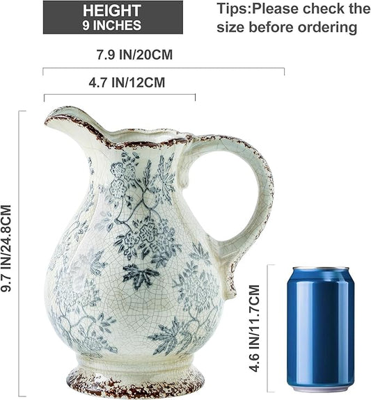 Blue and white ceramic pitcher vase with twin loop handles, curved spout, crackle pattern