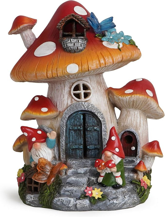 Mushroom house gnome decoration with arched doors, window, red mushroom caps, and fairy detail