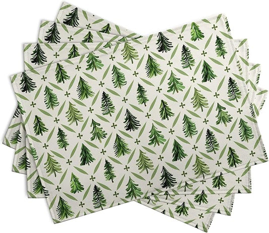Set of 4 pine tree Christmas placemats with sage green trees and star motifs on light base.