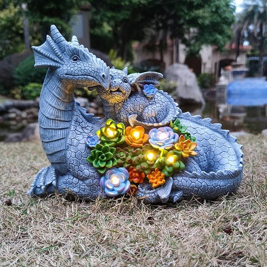 Solar LED dragon garden statue with two dragons and succulent flowers, warm glowing lights