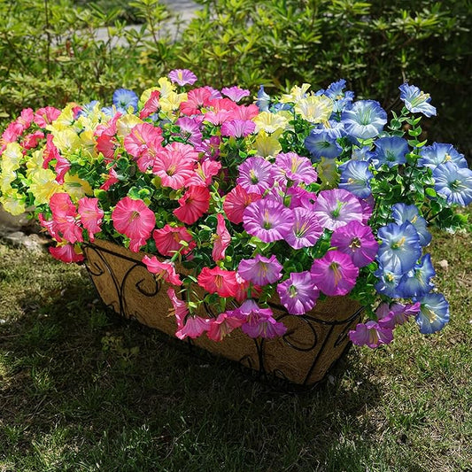 Multicolor faux morning glory flower bundle with green leaves in a brown planter