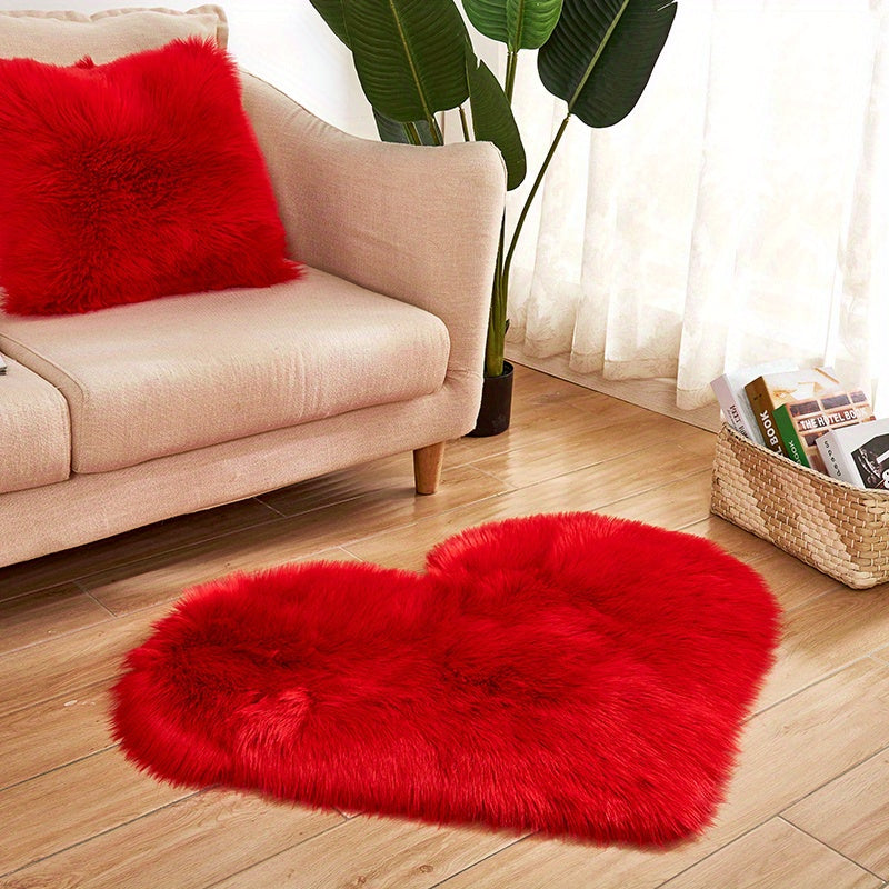 Plush heart-shaped area mat in red, soft faux wool pile