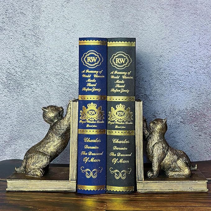 Antique gold cat resin bookends pair, cats flanking stacked books