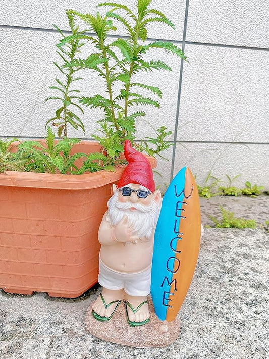 Garden gnome statue with surfboard, red hat, blue sunglasses, sandals and green straps