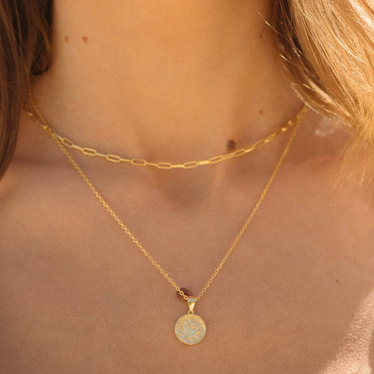 Gold vermeil sun pendant necklace with round medallion charm on a short chain