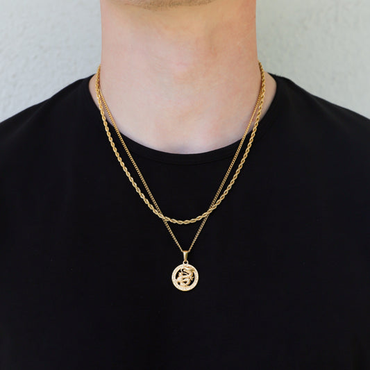 Gold dragon pendant necklace set featuring a round medallion charm on layered chains