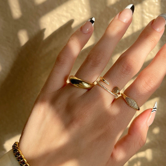 18K gold-plated signet pinky ring on hand