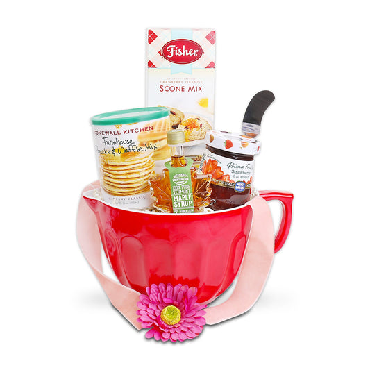 Red mug gift basket with baking mix, maple syrup, and scone mix with flower accent