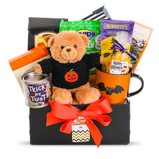 Halloween treats gift basket with plush bear in black pumpkin sweater and orange bow
