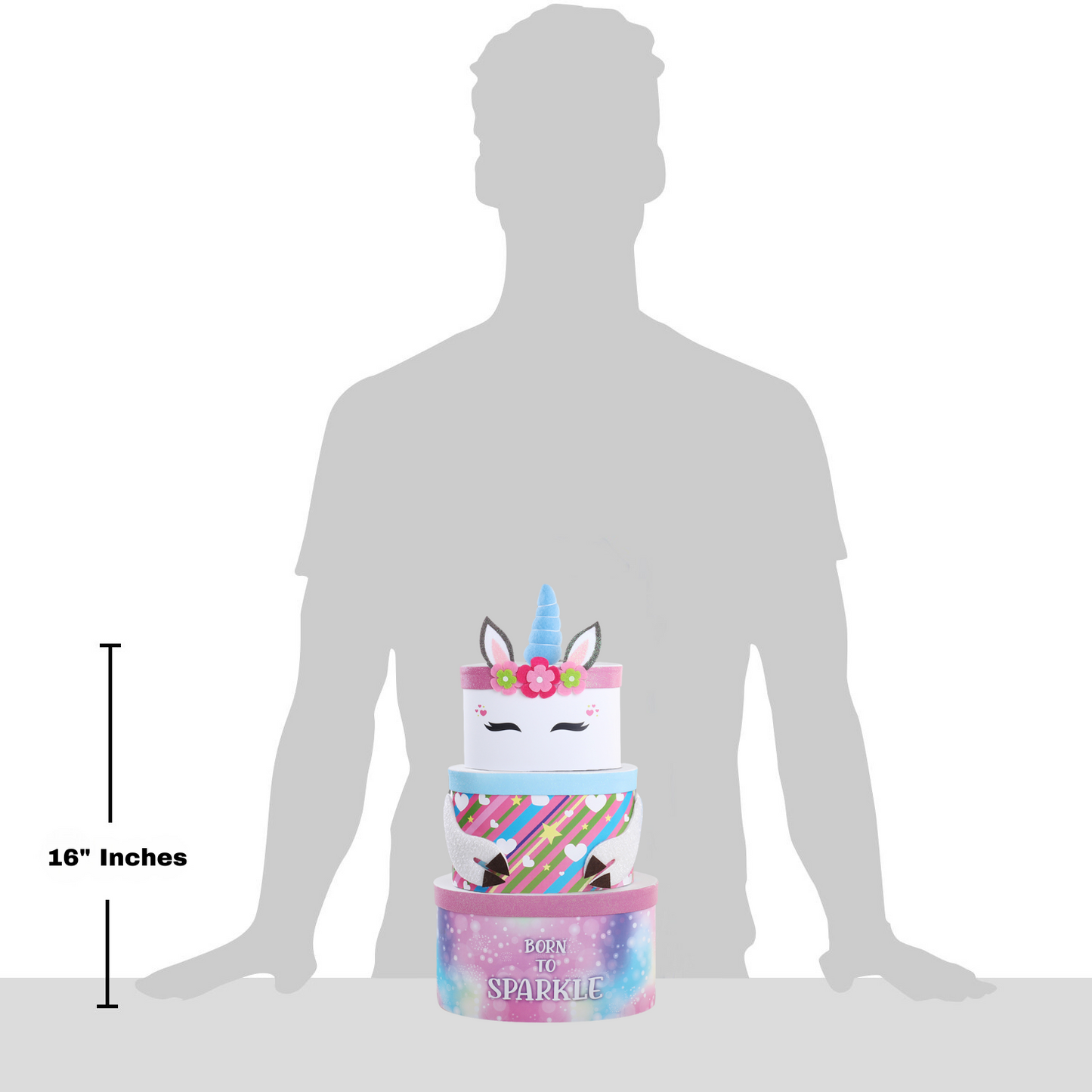 Unicorn gift tower height shown: about 16 in tall, held by standing figure silhouette