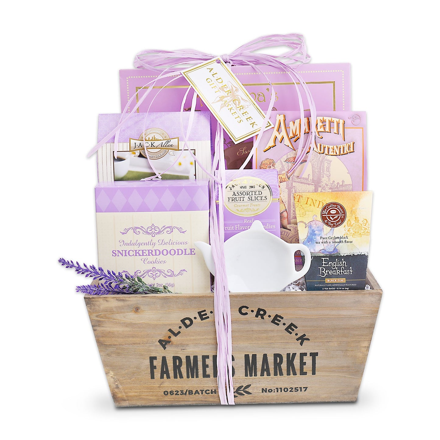 Lavender gift basket in wooden crate with purple ribbon, white mug, and lavender accents