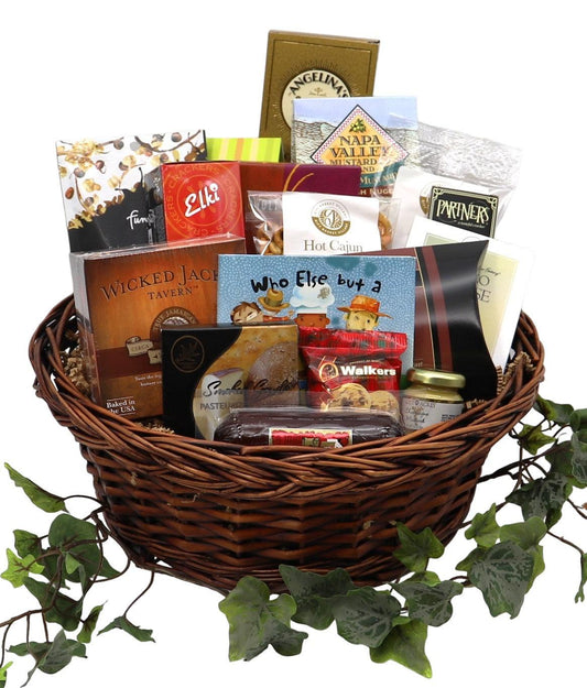 Wicker gift basket packed with assorted gourmet snacks, bags, and tins