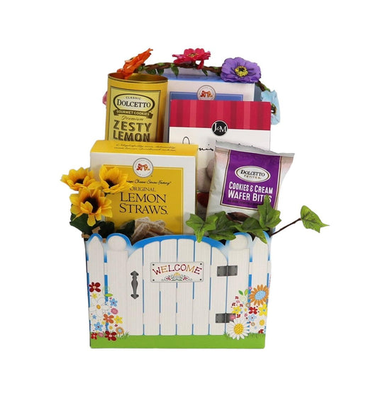 Welcome Home gift basket with welcome fence front and assorted lemon treats