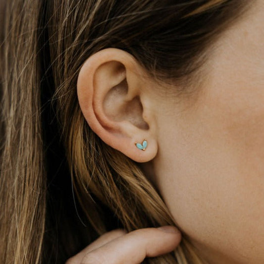 Quinn turquoise heart-shaped stud in a gold setting