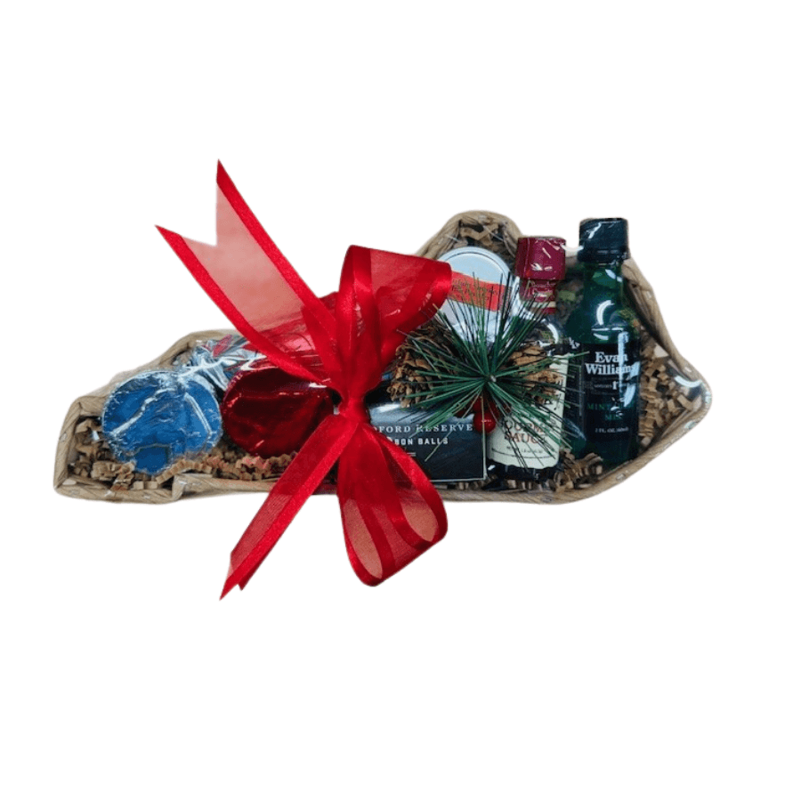 Small Kentucky gift tray with wrapped candies, bottles, and red ribbon bow
